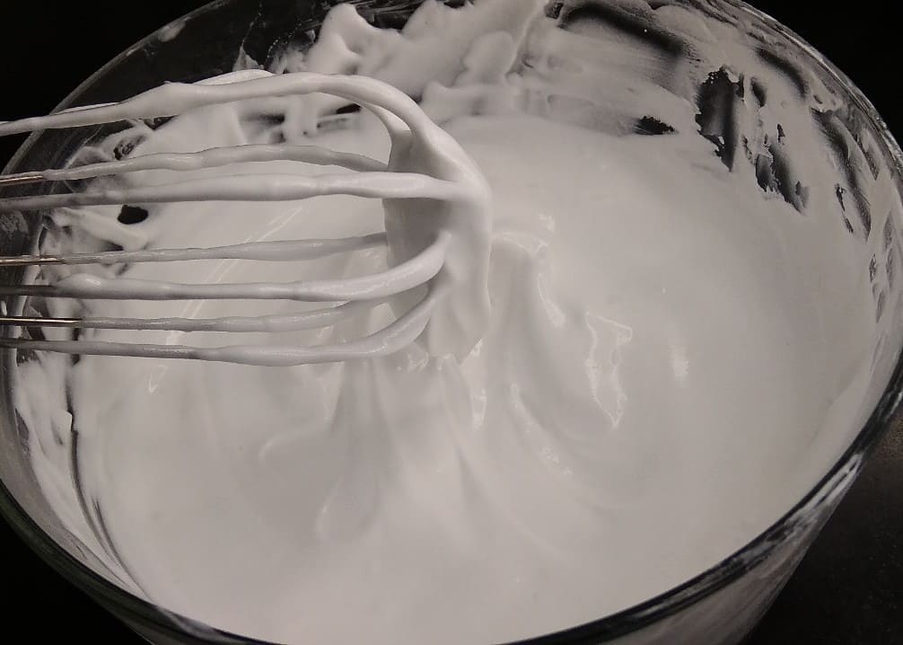 Whisk the whipping cream.